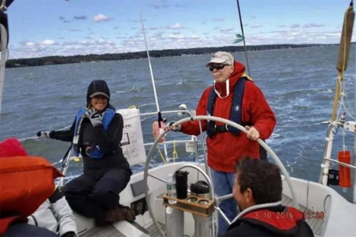Richard A. Parent on a boat with others
